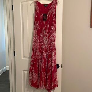 Long flowy red dress was sequins along the top bodice brand new